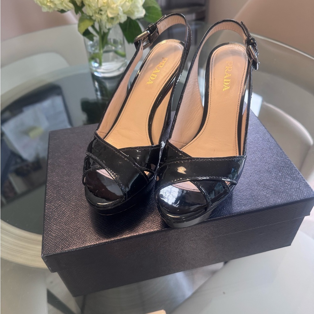 Black patent Prada platform sandals. In very good preloved condition. Size 38
